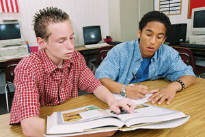 Two boys studying
